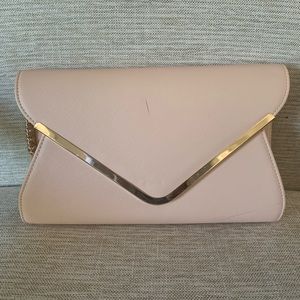 Pink and gold clutch